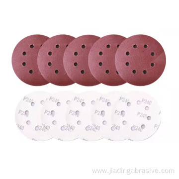 Hook and loop sanding disc backing pad